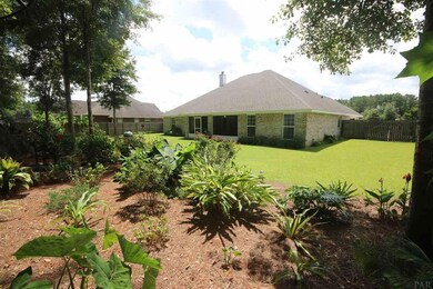 a lovely garden w/ a large variety of plants!