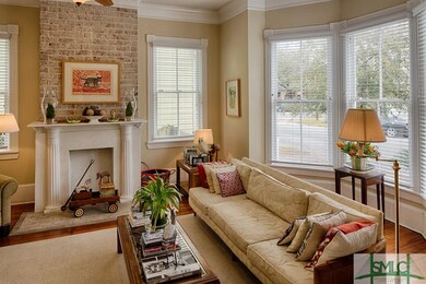 The living room, filled with light from large wind