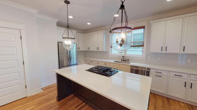 Look at the natural light and counter tops in the kitchen!