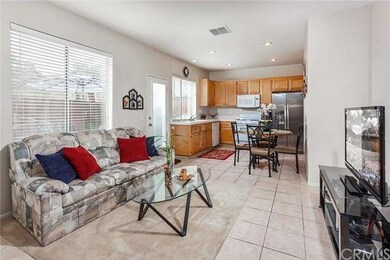 Open concept family room and eat-in kitchen.
