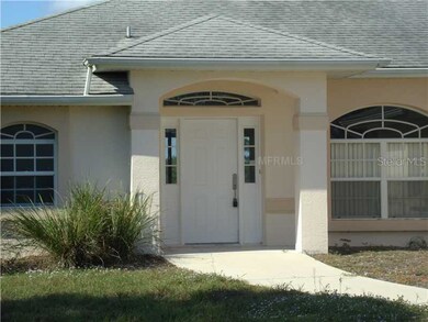 Entrance - covered front entry with transom window