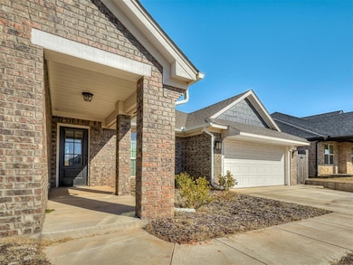 Doorway to property featuring a garage