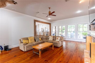 Living room with reclaimed wood beams from 1800's