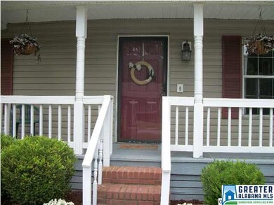 Cozy, welcoming front porch and freshly painted fr
