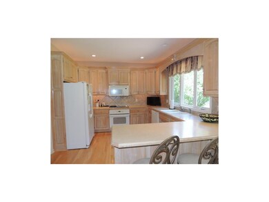 Bright and sunny kitchen with large pantry between