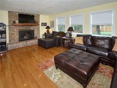 Brick fireplace is gas burning.