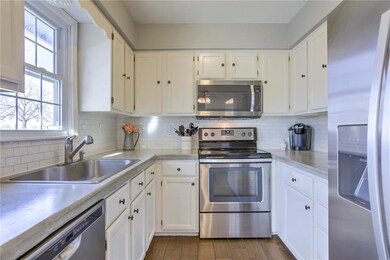 Beautiful white cabinets and stainless steel appli
