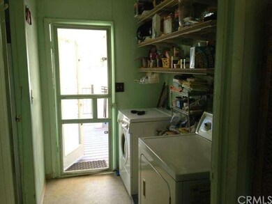 Inside laundry area with access from outside 