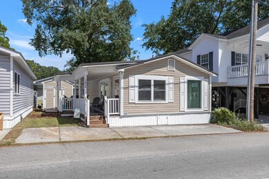 View of front facade featuring covered porch and a
