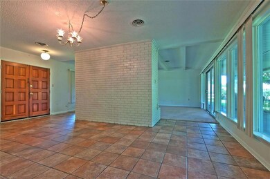 Dining Area with Foyer on the left and Formal Livi