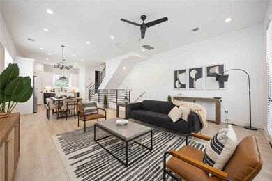Open concept living/dining/kitchen. Photo of the m