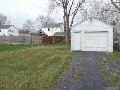Backyard. The back yard and garage.