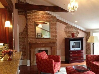 Living Room. Open Kitchen with Bar Overlooks Livin