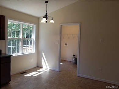 Eat In area leads to Laundry/mud room.