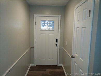 Entry way with new designer front door with upper