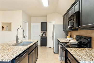 Open kitchen with elevated ceilings