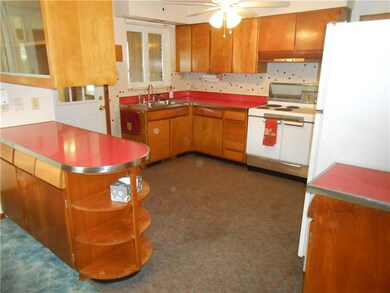 Plenty of cabinetry in the kitchen.  Appliances pr
