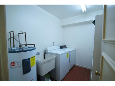 Other. Laundry room/ storage room with hot water t