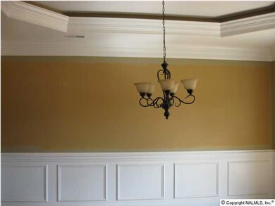Dining Room with chair rail and beauty boxes.