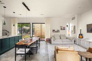 Living room with finished concrete floors