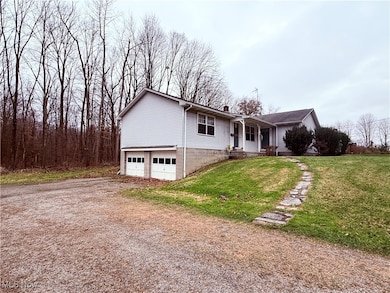 7620 Thompson Sharpsville Rd NE, Burghill, OH 44404 - photo 4