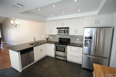 Kitchen leads into Dining Area on left.  Upgraded 