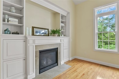 Living Room gas fireplace & built-in shelves and s