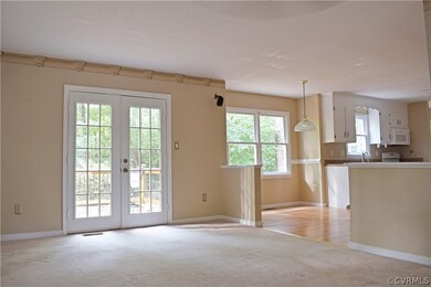 Great room with french doors to deck