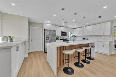 KITCHEN WITH EAT-IN ISLAND