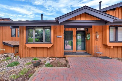 Entrance to property featuring board and batten si