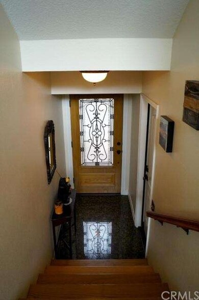 Elegant Foyer Entry with Granite Tile Flooring and