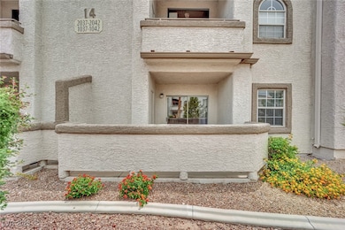 Property entrance featuring stucco siding