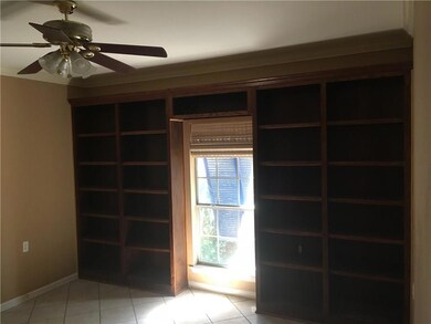 Bedroom 1 with beautiful built-in book case/ enter