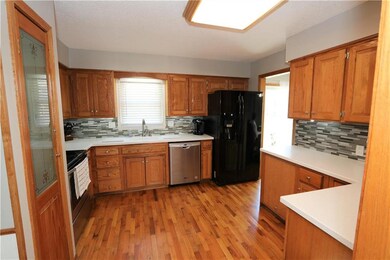 410 N Adams St, Raymore, MO 64083 - photo 6