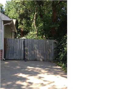 Extra driveway the length of home to park an RV or