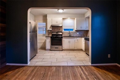 Open concept to kitchen w/stainless appliances