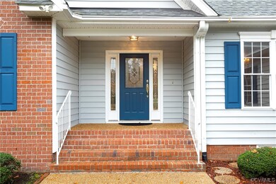 Entrance to property with a porch