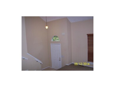Vaulted great room upon entering the home