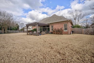 Back of house featuring outdoor patio area and a n