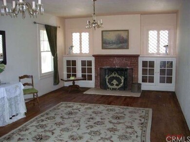 Half of spacious living room looking toward the fi