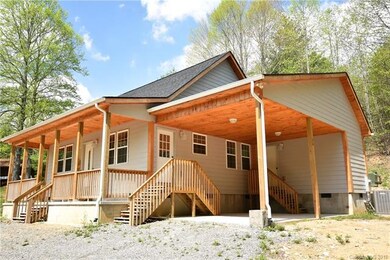 Side View showing Carport and Covered Front Porch