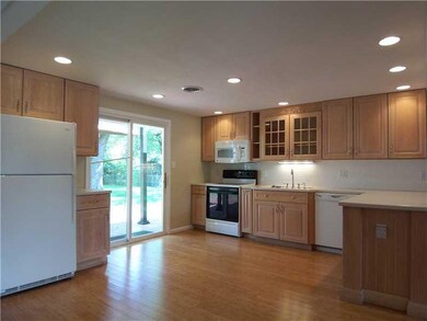 Kitchen. Fully Updated Kitchen 15 x 14 w. Tile Splash Back, Custom Cabinets, Solid Surface Counters, and Recessed Lighting!