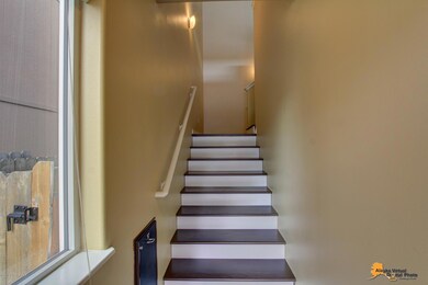 Entrance & stairs to Upper Level