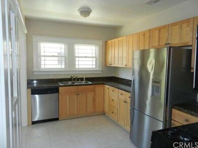 Remolded Kitchen with Maple Cabinets & Stainless S