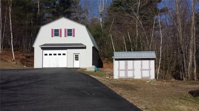 Large detached garage with upstairs...