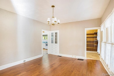 Formal dining room or could be the new living room if current living room becomes a primary suite.