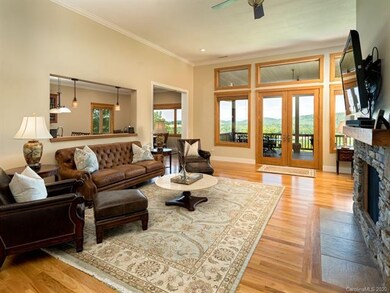 Immediately you will want to step onto the covered deck and soak in the distant views.