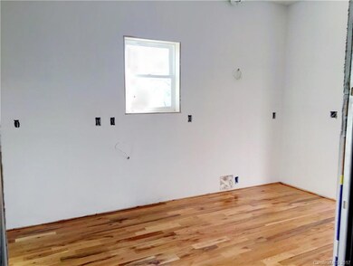 Kitchen wall where cabinets/range will be installed