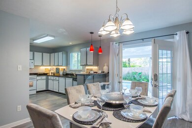 Dining Area opens to Covered Porch looking out to 