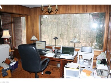 Office/Dining room.  Large picture window brings t